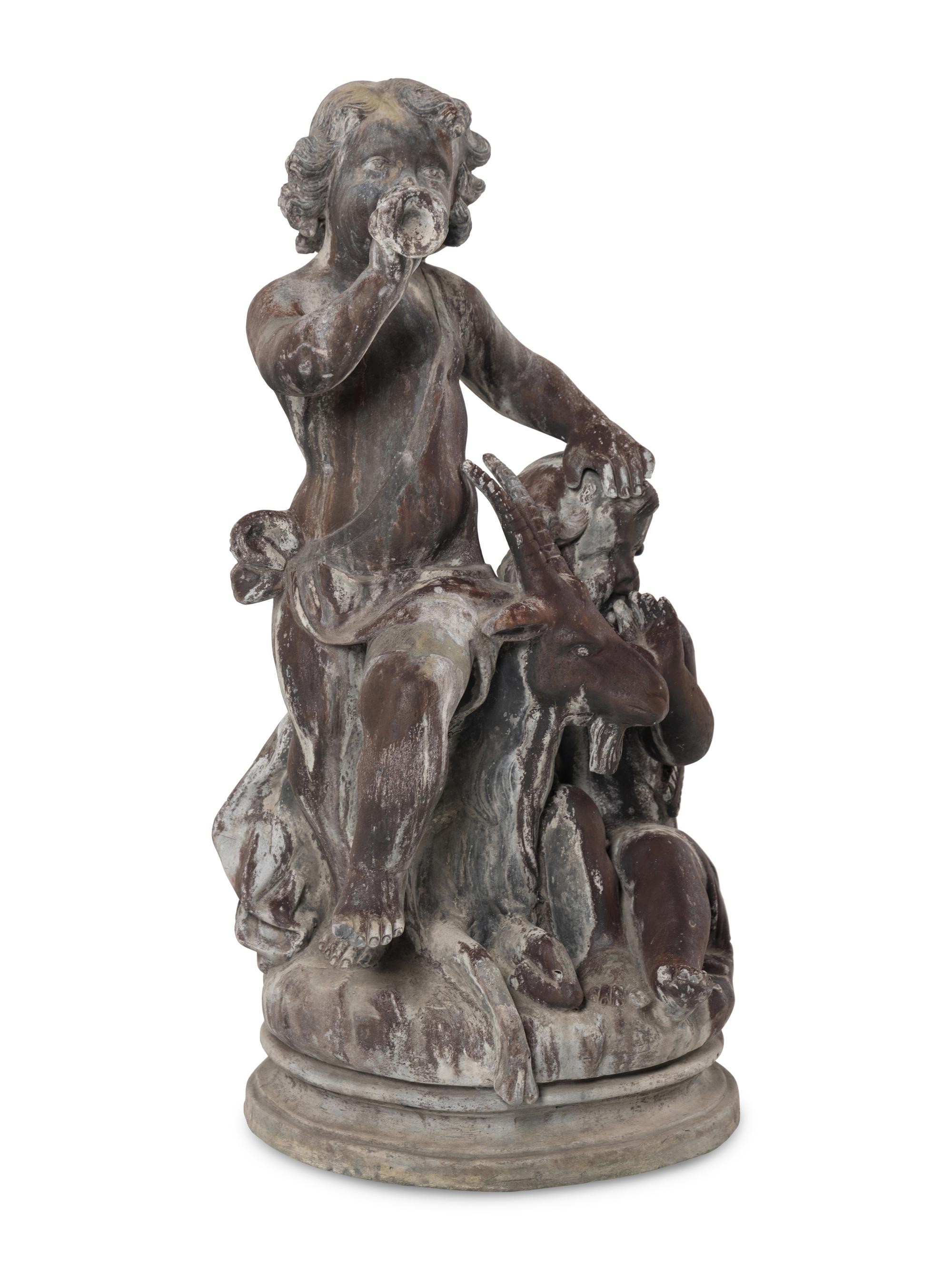 A Cast Lead Figural Group
