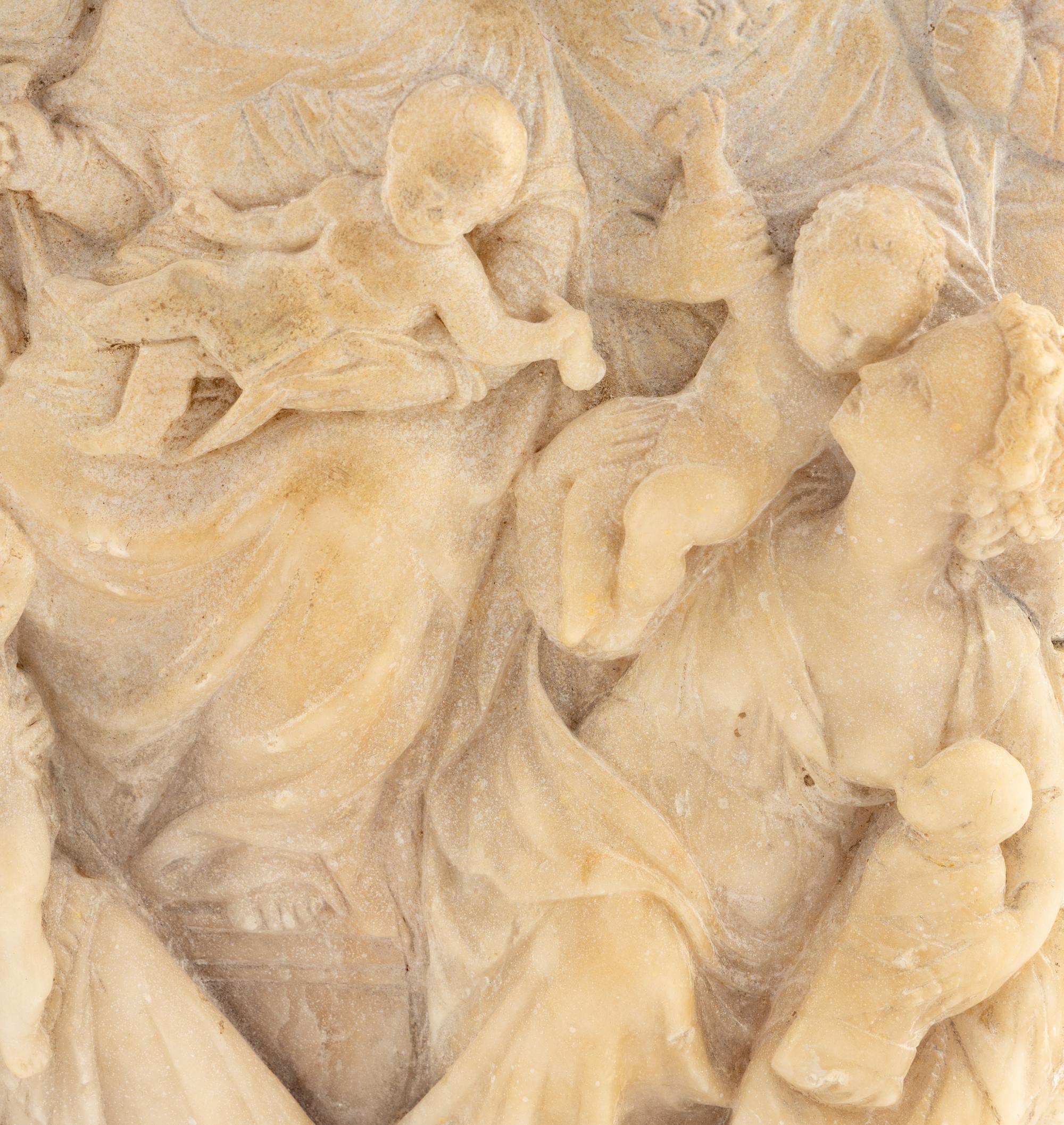 A Continental Carved Marble Relief Plaque