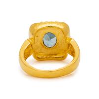 HIGH KARAT GOLD AND BLUE TOPAZ RING