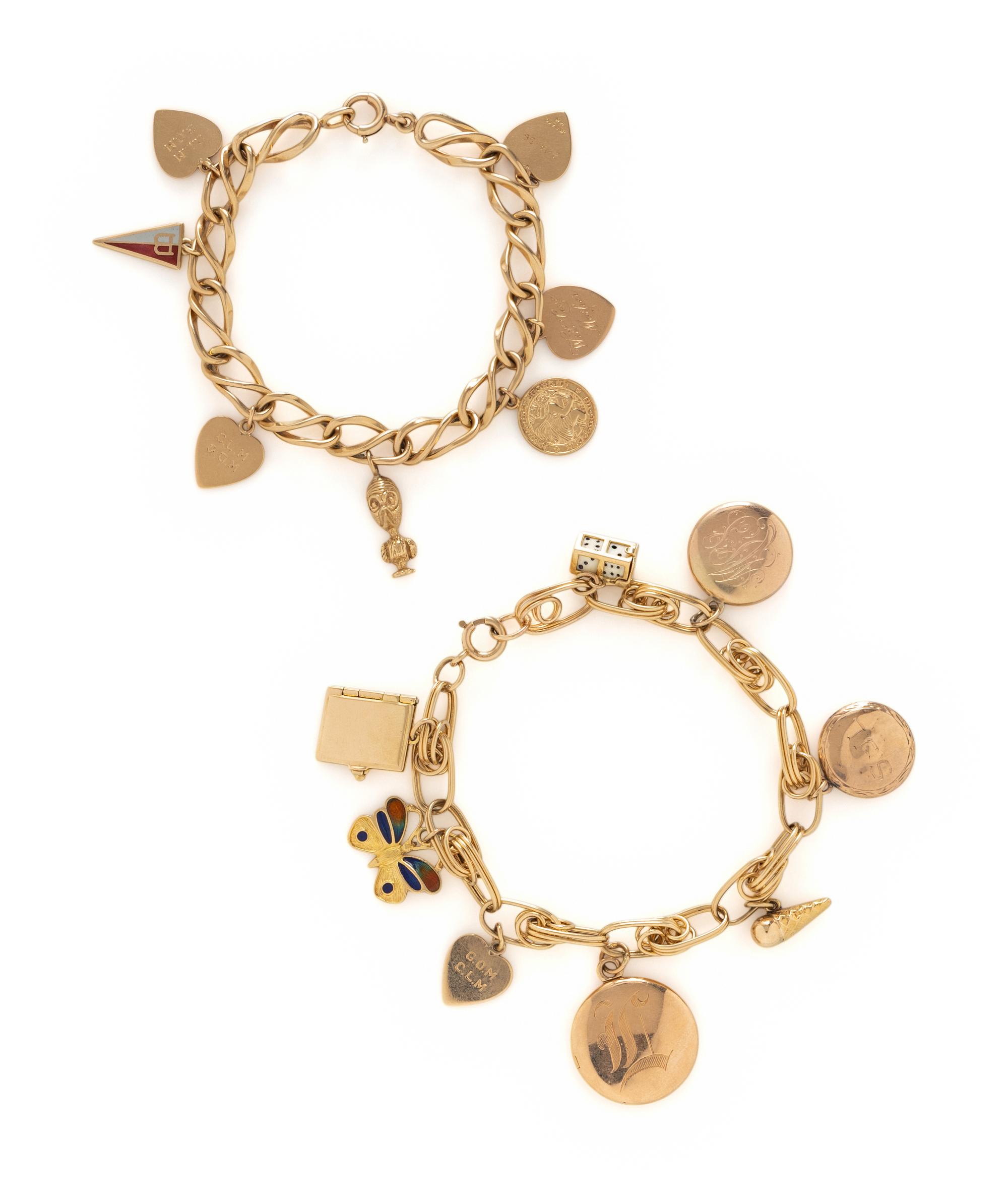 COLLECTION OF YELLOW GOLD CHARM BRACELETS