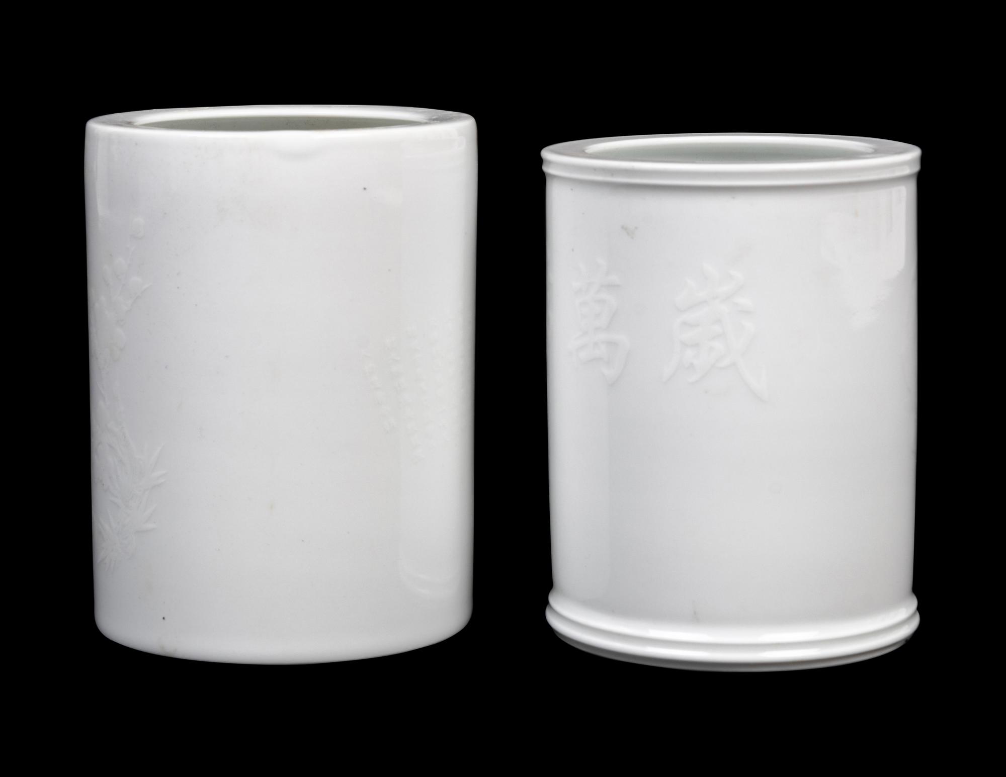 Two White Glazed Porcelain Brushpots, Bitong