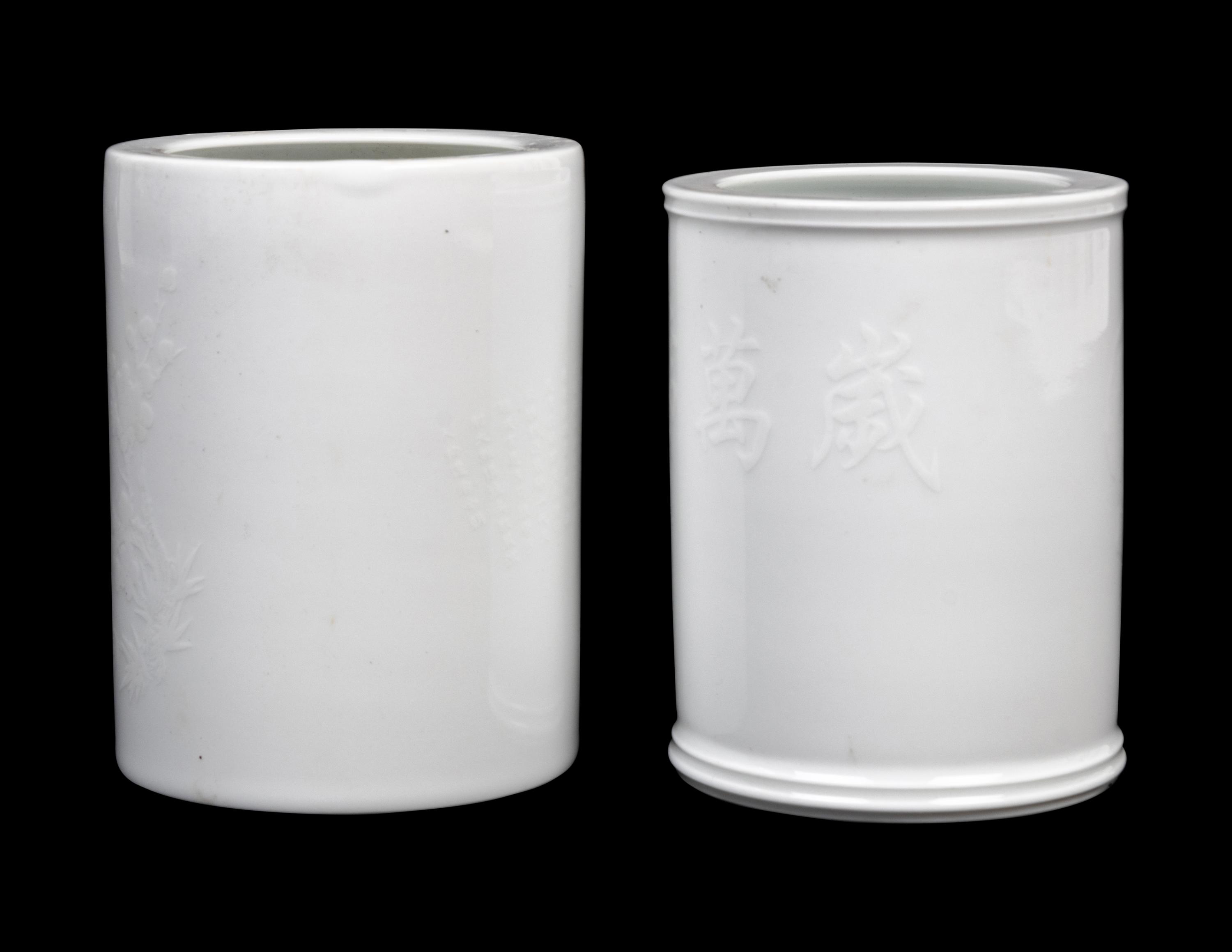 Two White Glazed Porcelain Brushpots, Bitong