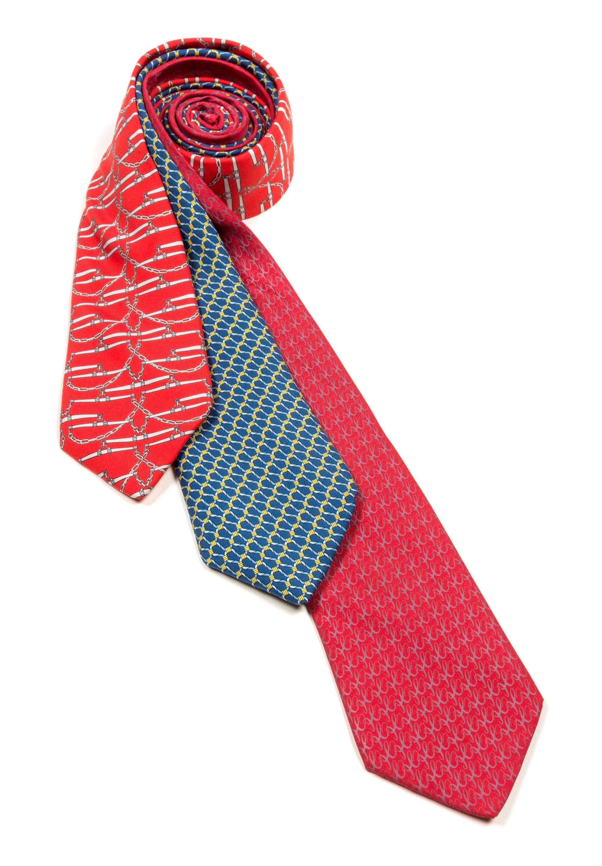 A Group of Three Hermes Silk Ties, 3.15" wide.