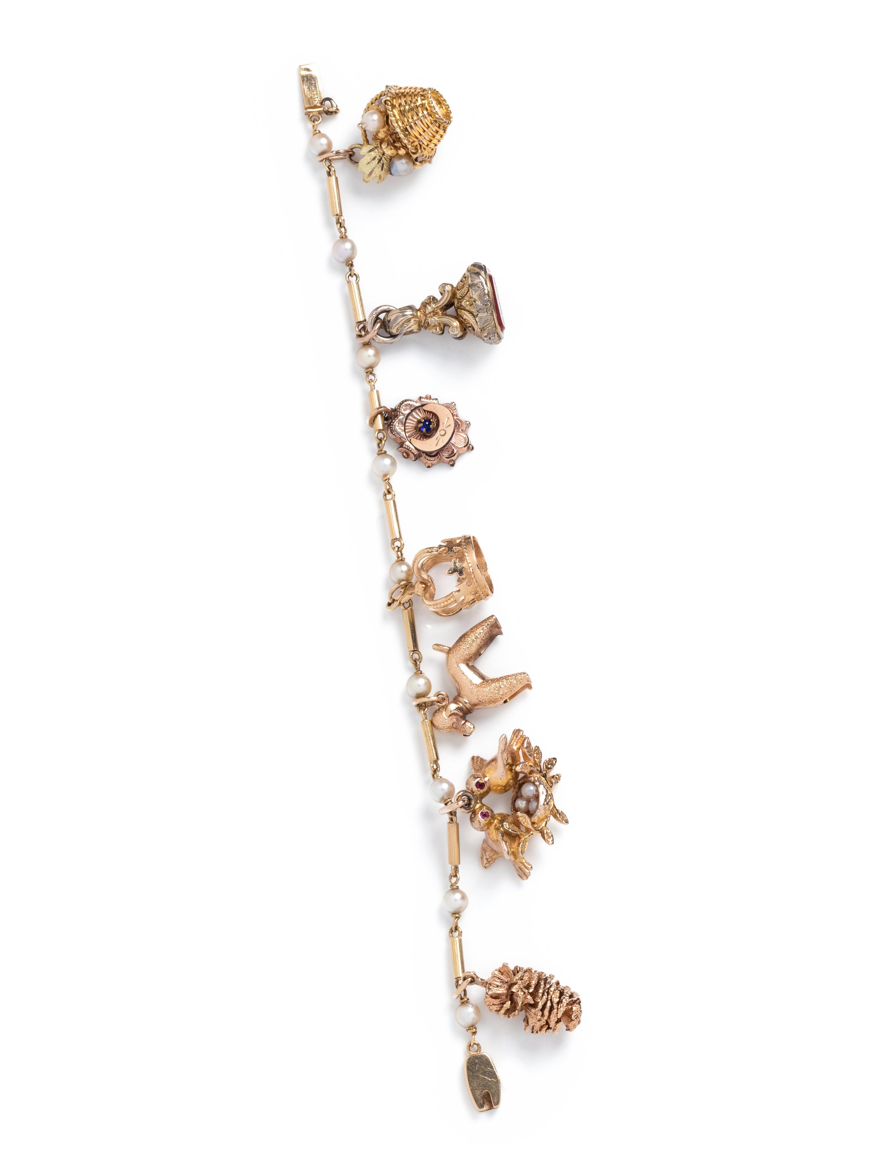 YELLOW GOLD AND GOLD-FILLED CHARM BRACELET