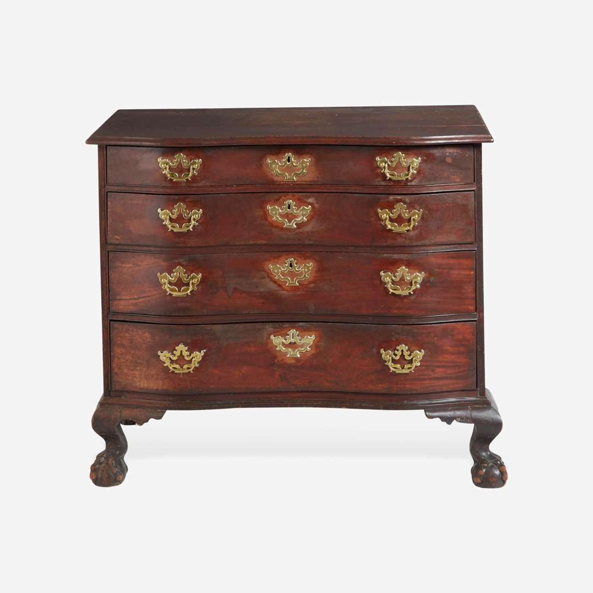 A Chippendale carved mahogany oxbow chest of drawers New England, probably Boston, MA, circa 1770