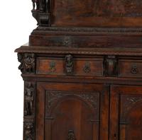 A Continental Baroque Walnut Cabinet
