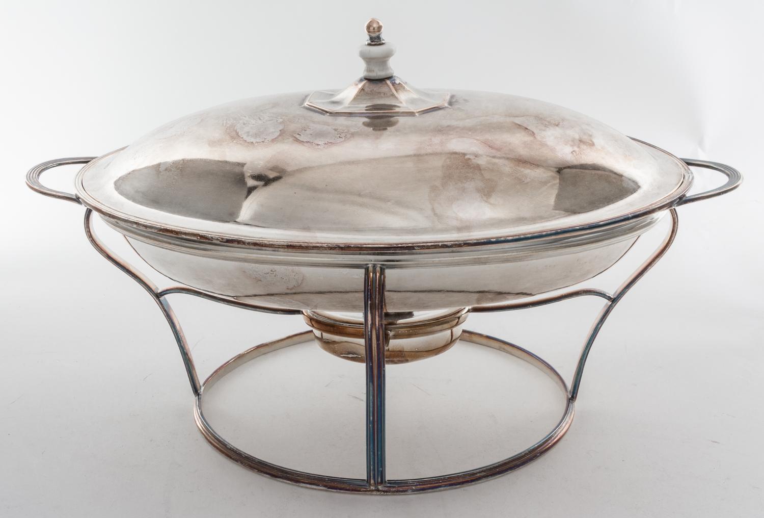 A Sheffield-plate Entree Dish and Cover, Early 19th Century, of two handled oval form, set on a warming stand with a spirit lamp.