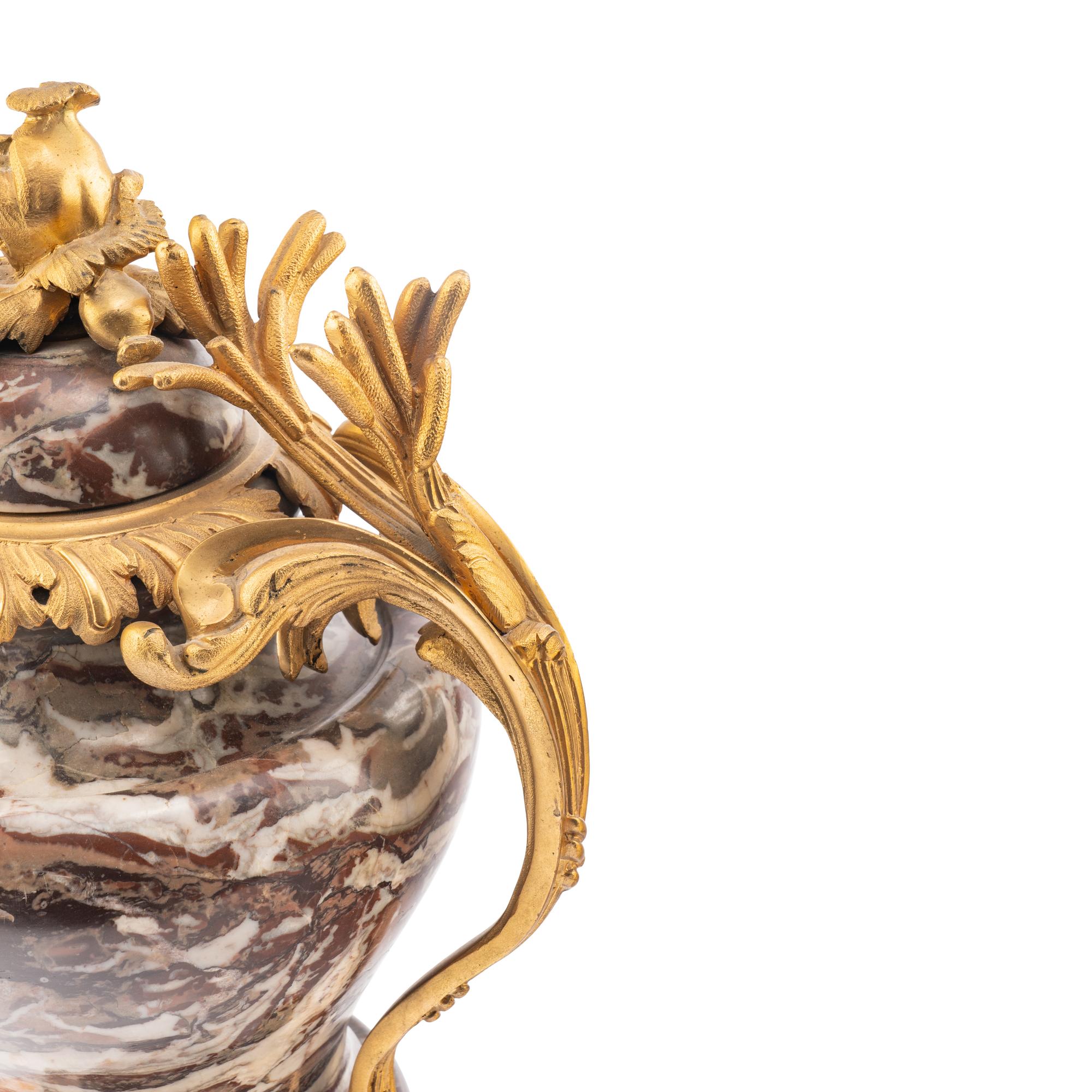 A Pair of French Gilt Bronze Mounted Marble Urns