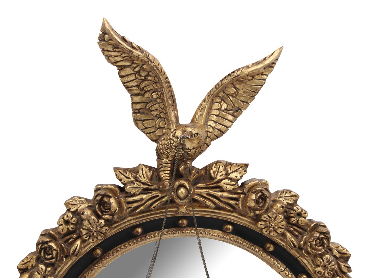 A Pair of Regency Style Ebonized and Parcel-Gilt Mirrors