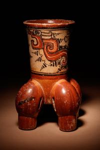 A Maya Polychrome Vessel with Rattle Feet