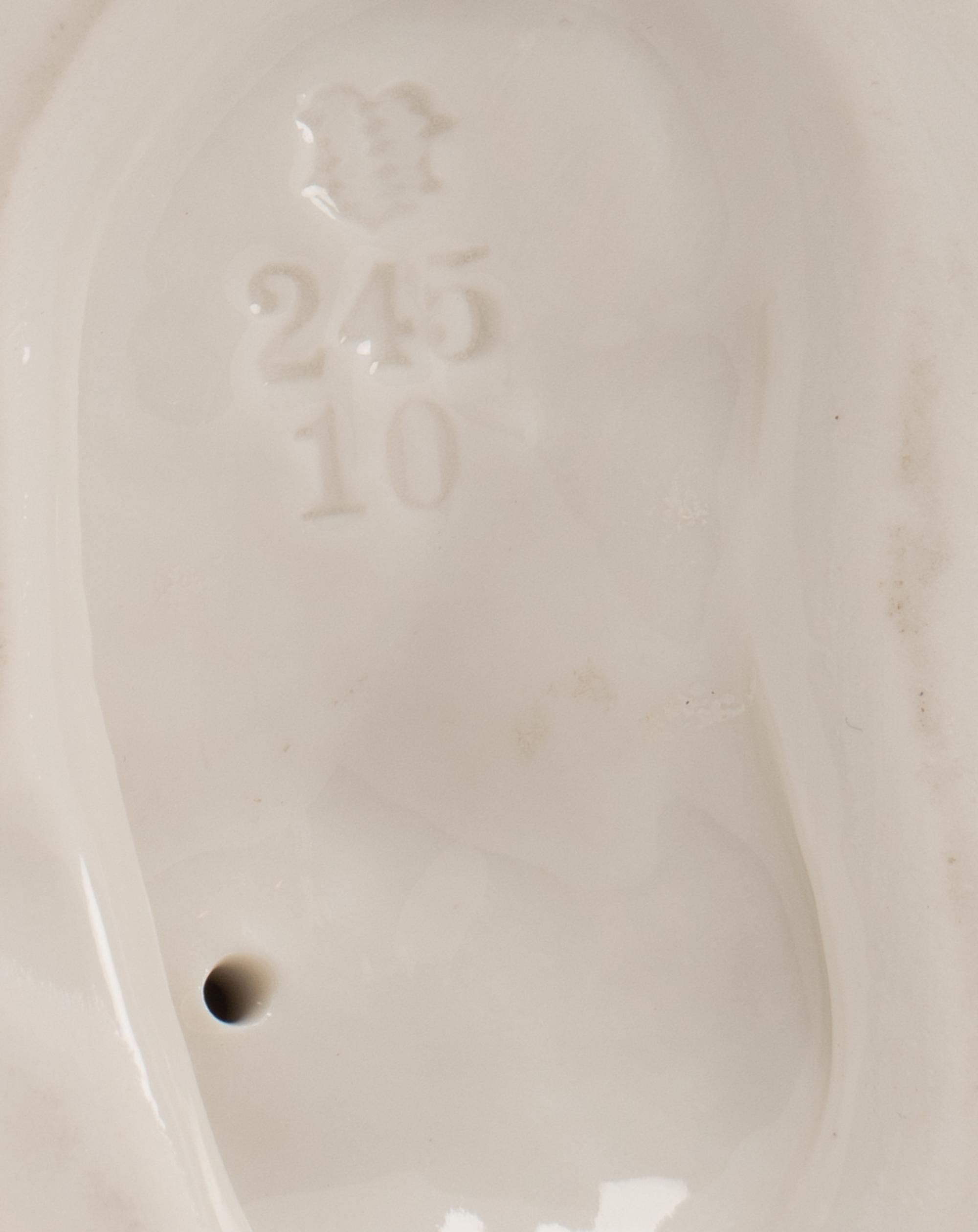 A Group of Seven White Porcelain Articles