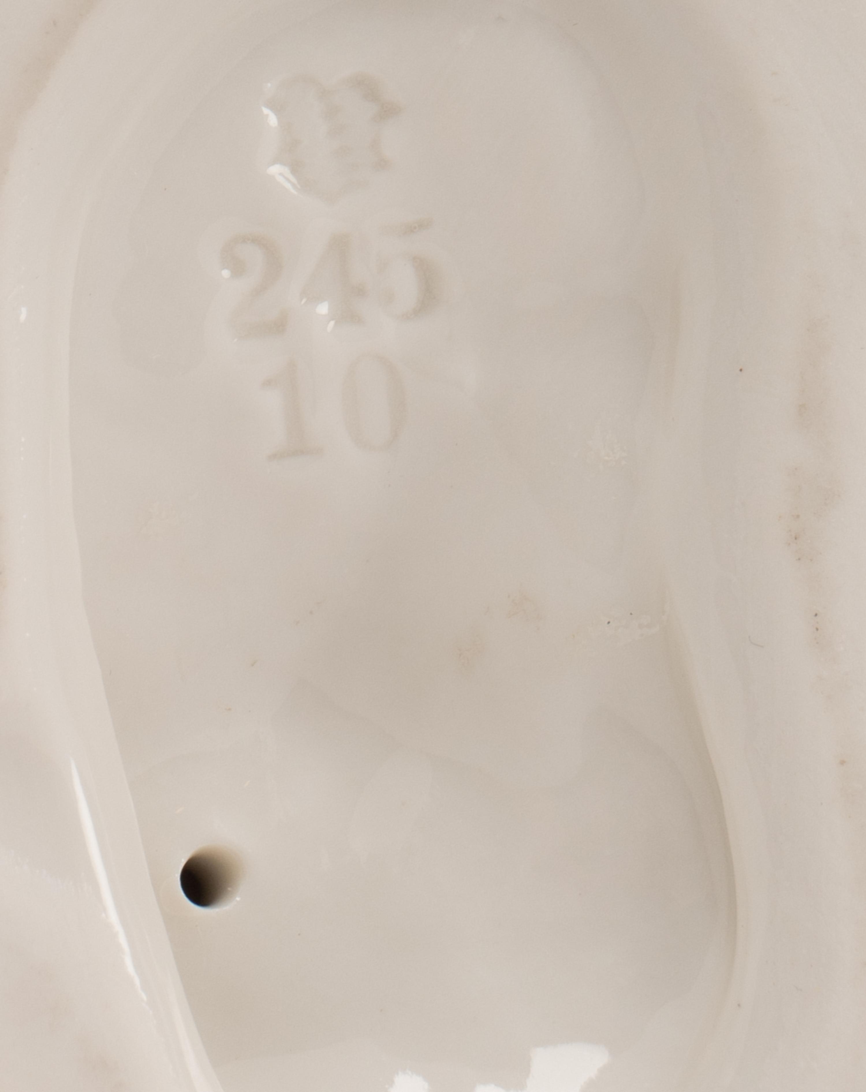 A Group of Seven White Porcelain Articles