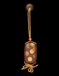 A Japanese Simulated Leather and Lacquered Four-Case Inro