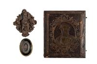 [EARLY PHOTOGRAPHY]. A group of daguerreotype portraits, incl. pendant, possible Hawaiian subject, and case featuring portrait of Daguerre.