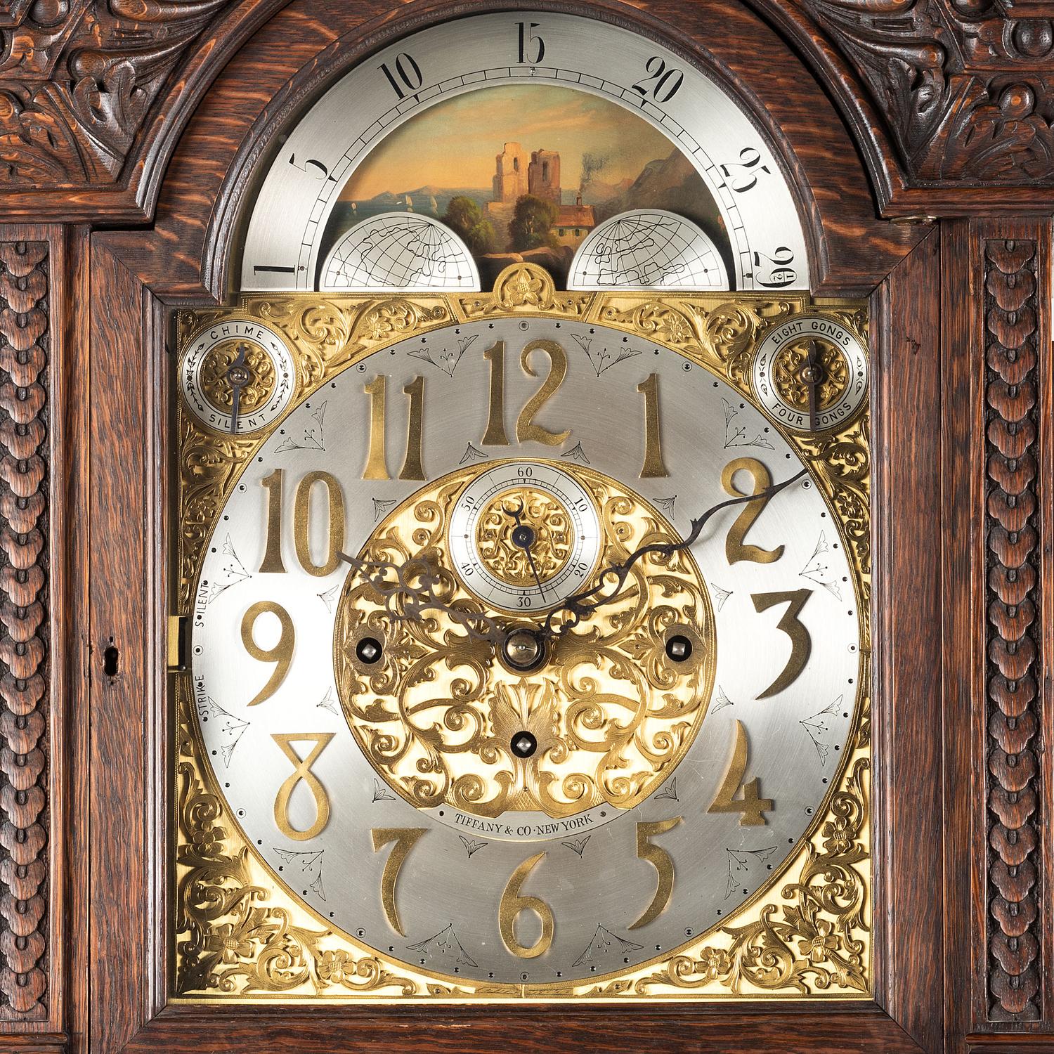 A Renaissance Revival Carved Oak Tall Case Clock