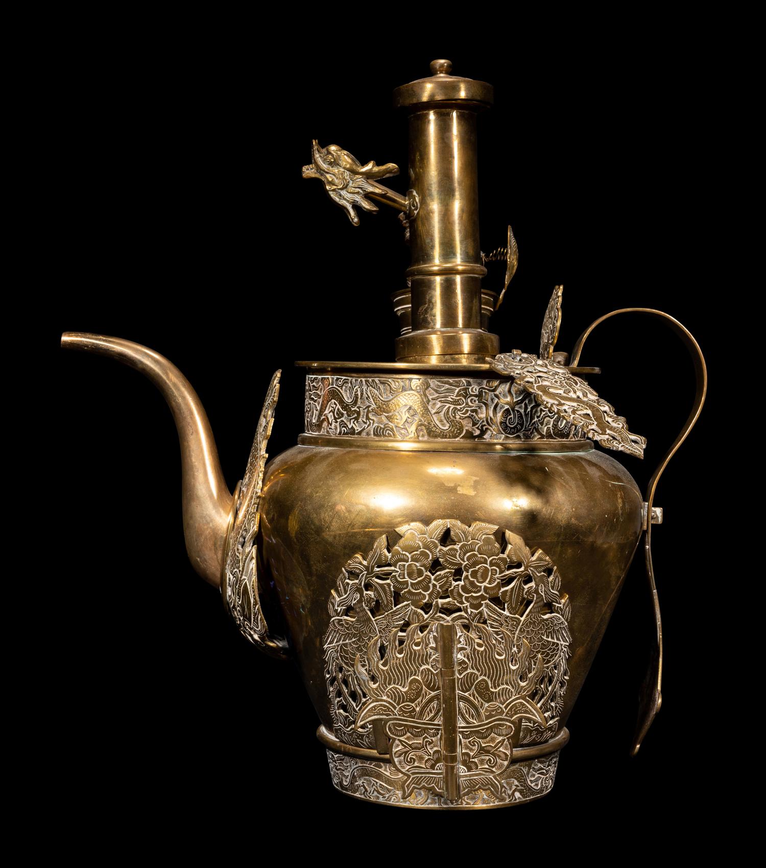 A Tibetan Silver and Copper Covered Ewer and A Chinese Bronze Pitcher