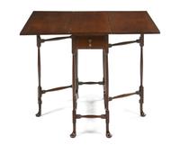 A Queen Anne Style Mahogany Drop-Leaf Table, Height 27 x width 34 1/2 x depth 29 3/4 inches (open).
