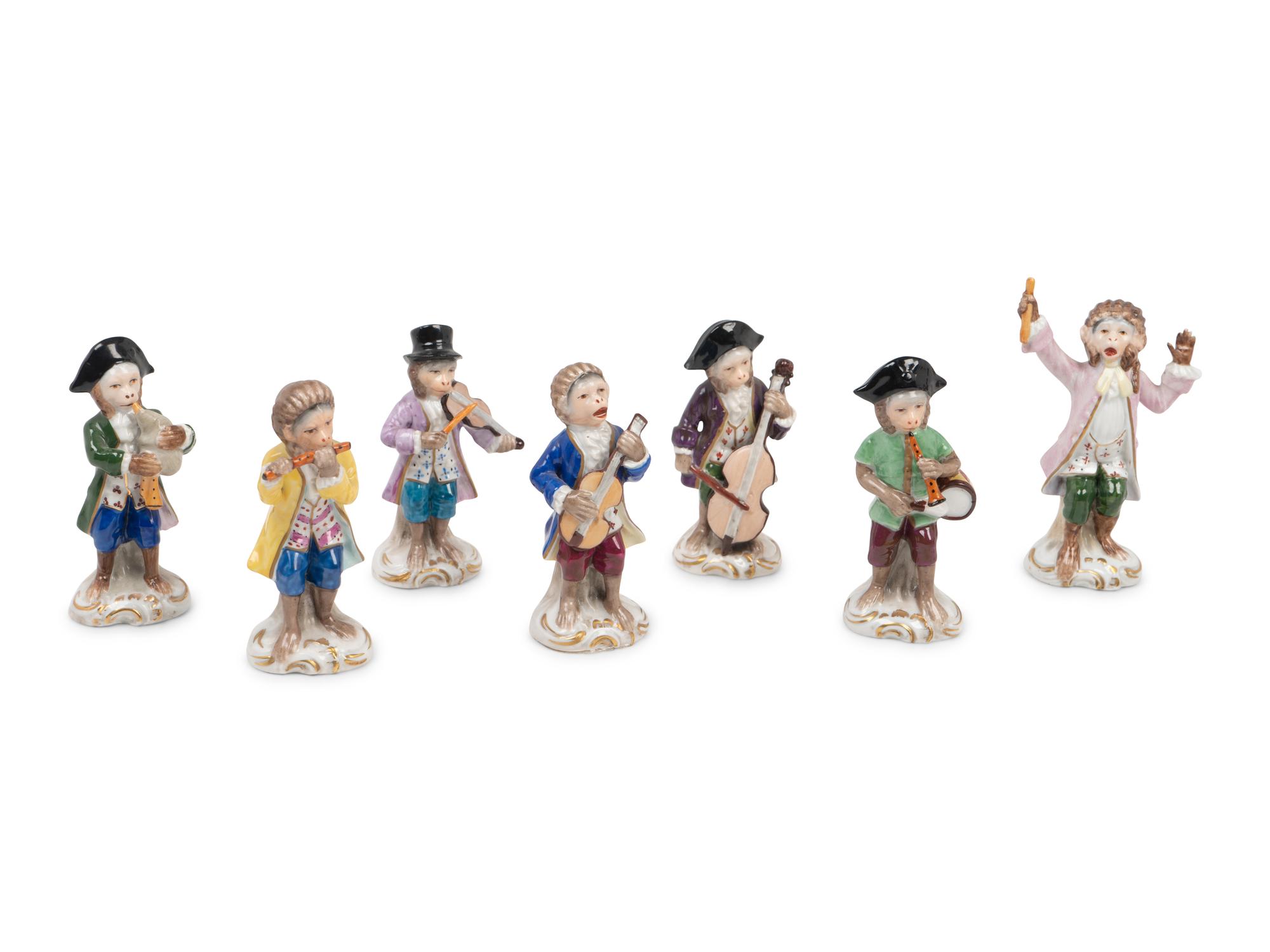 A German Porcelain Twelve-Piece Monkey Band