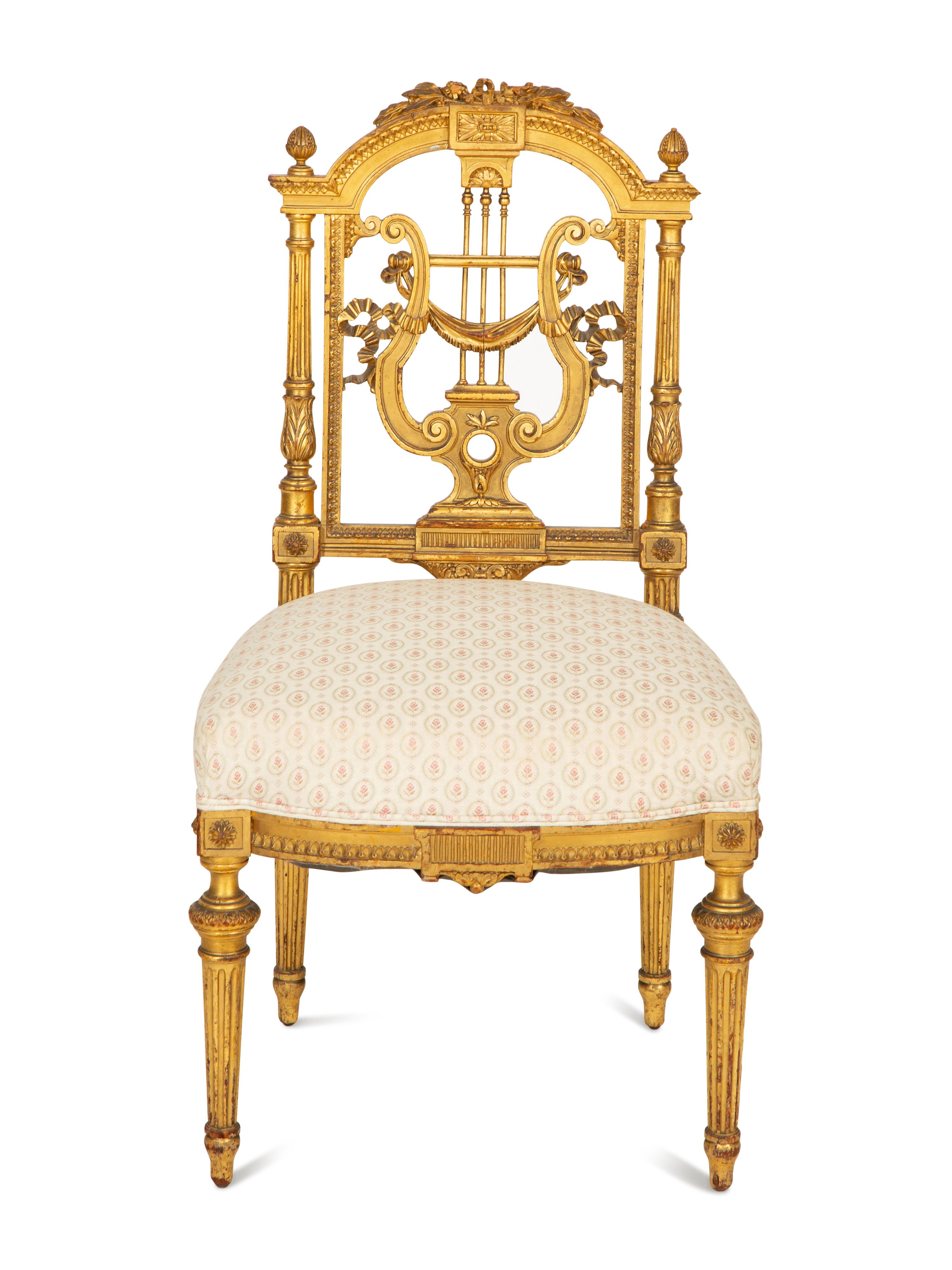 A Diminutive Louis XVI Style Giltwood Lyre-Back Chair