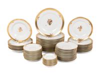 A Royal Copenhagen Golden Basket Porcelain Dinner Service