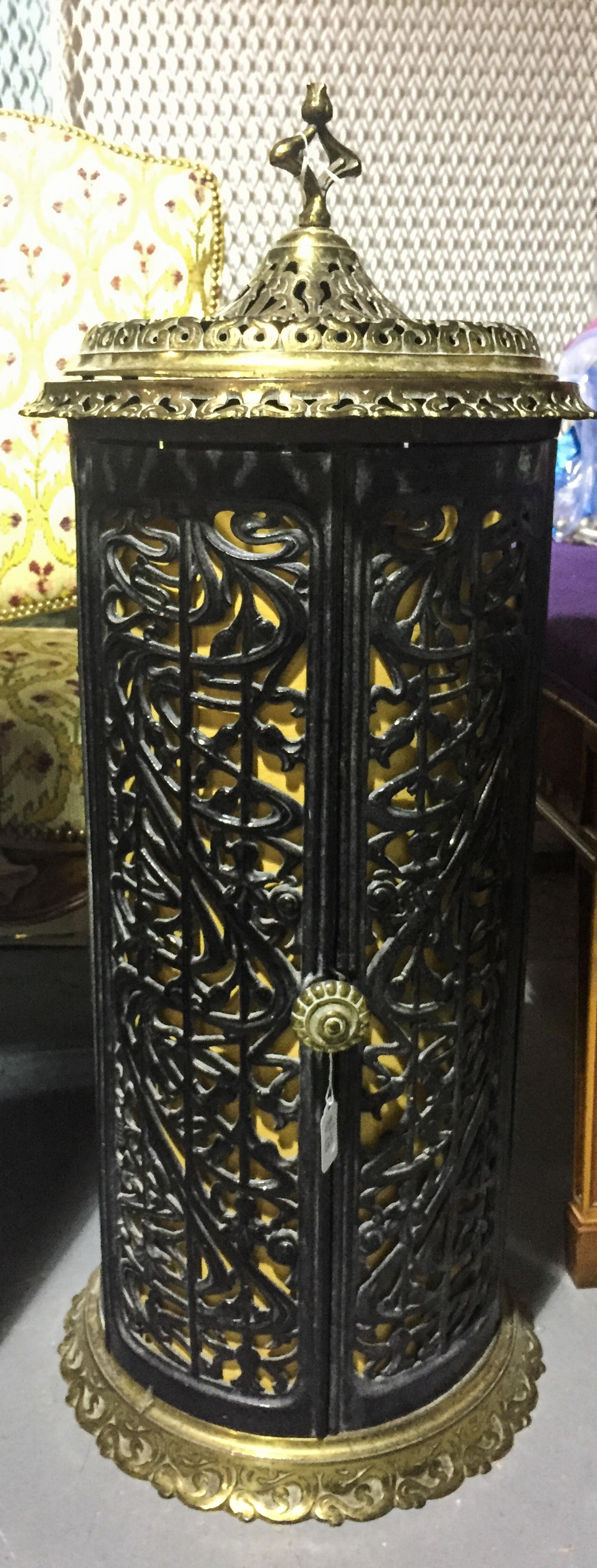 A Victorian Brass and Iron Stove Height 34 1/4 inches. — 19TH/20TH CENTURY