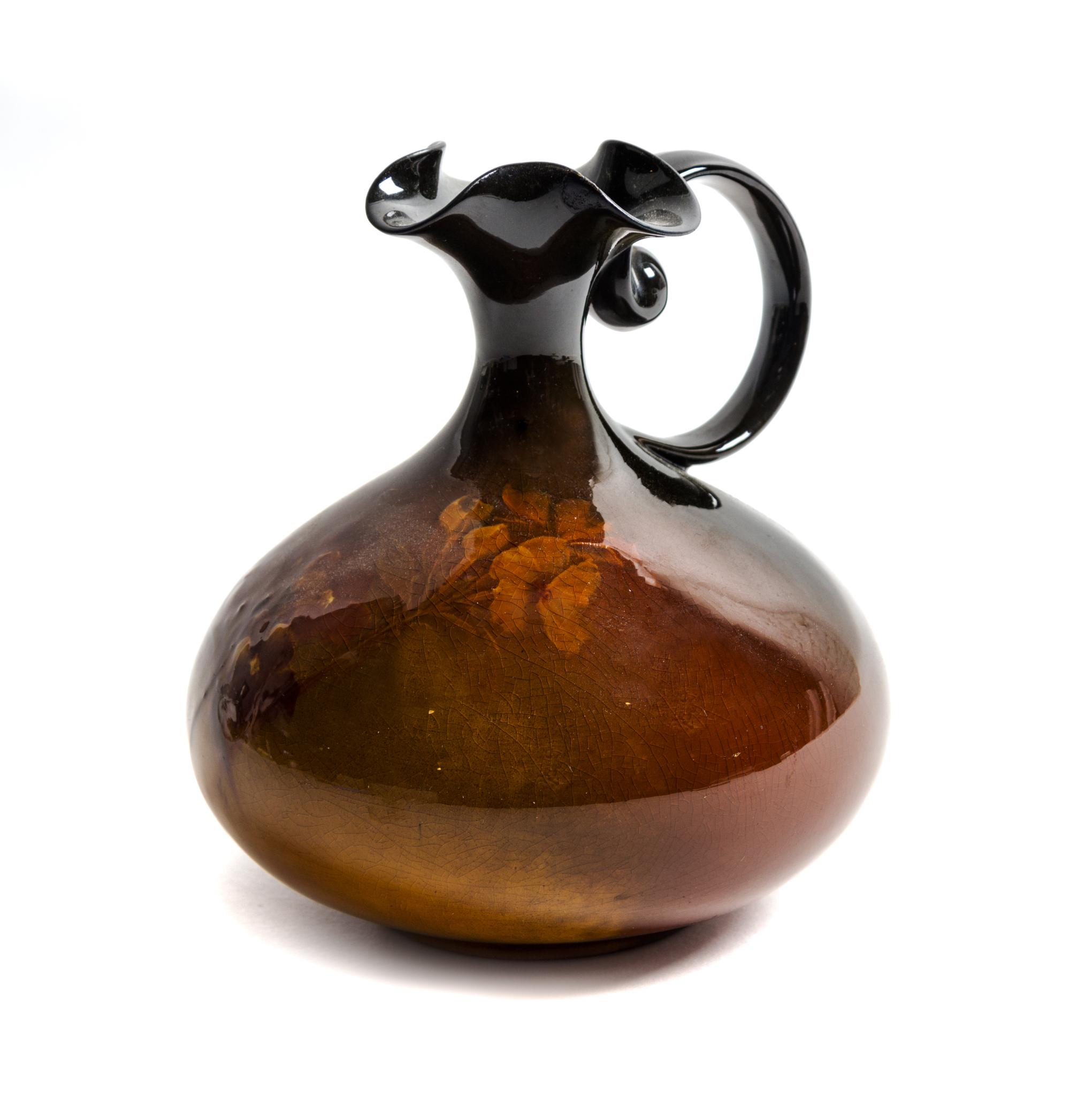 A Weller Pottery Ewer Height 5 3/4 inches.