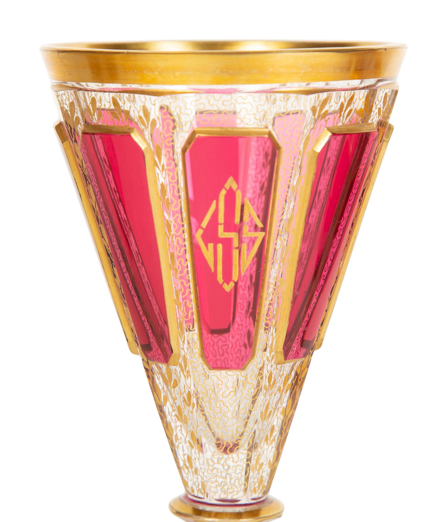 A Set of Bohemian Gilt Decorated Glass Stemware