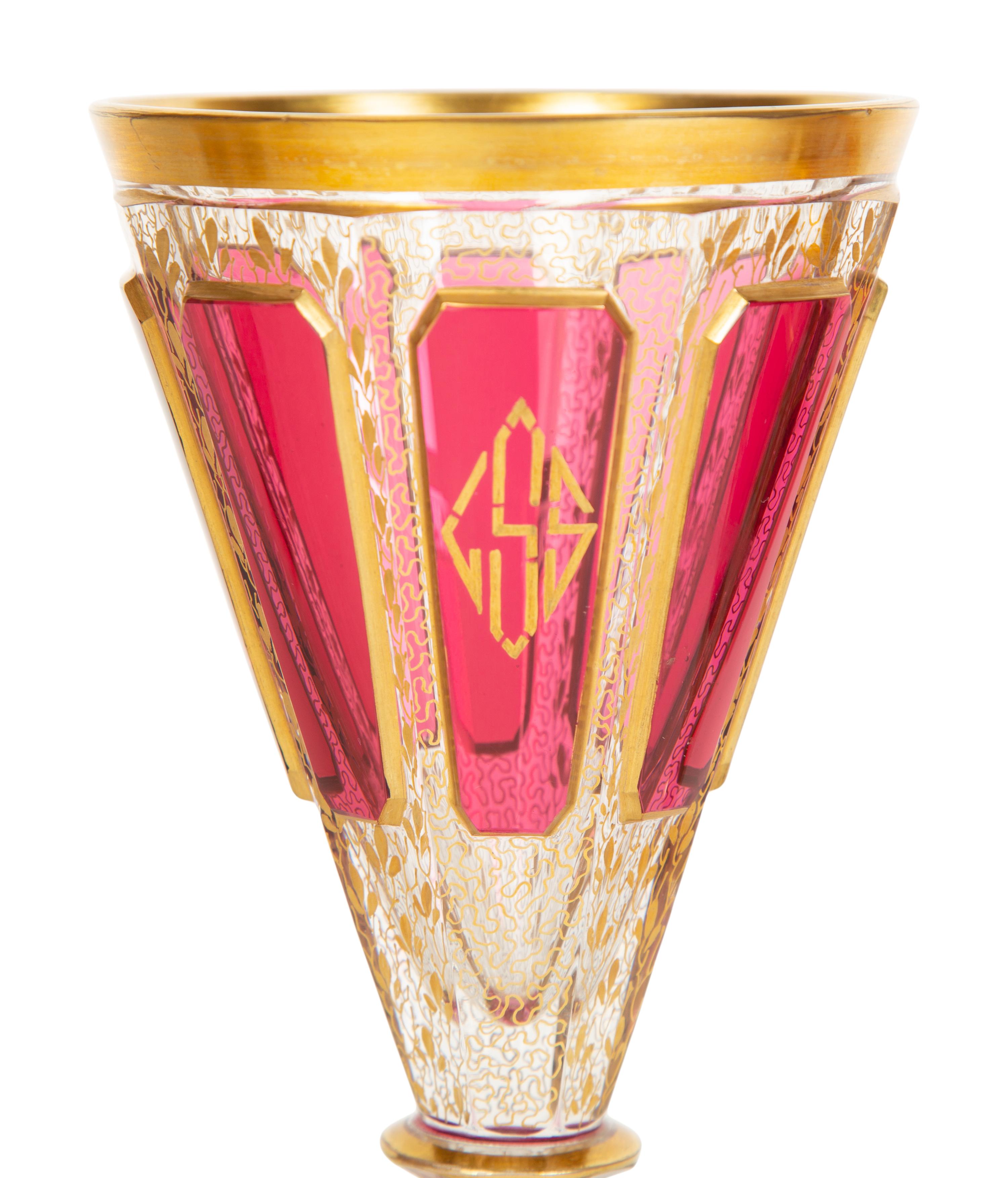 A Set of Bohemian Gilt Decorated Glass Stemware