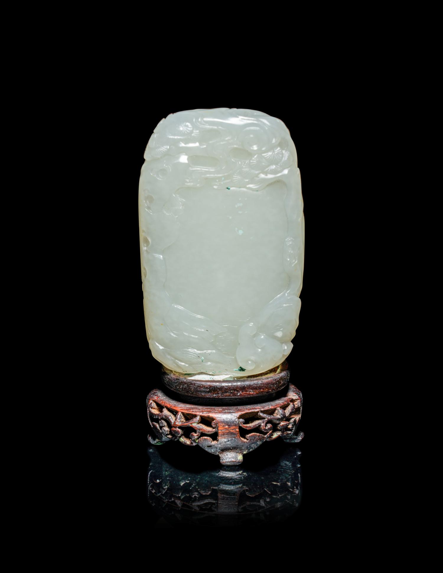 A Chinese White Jade 'Scholars Playing Go' Carving