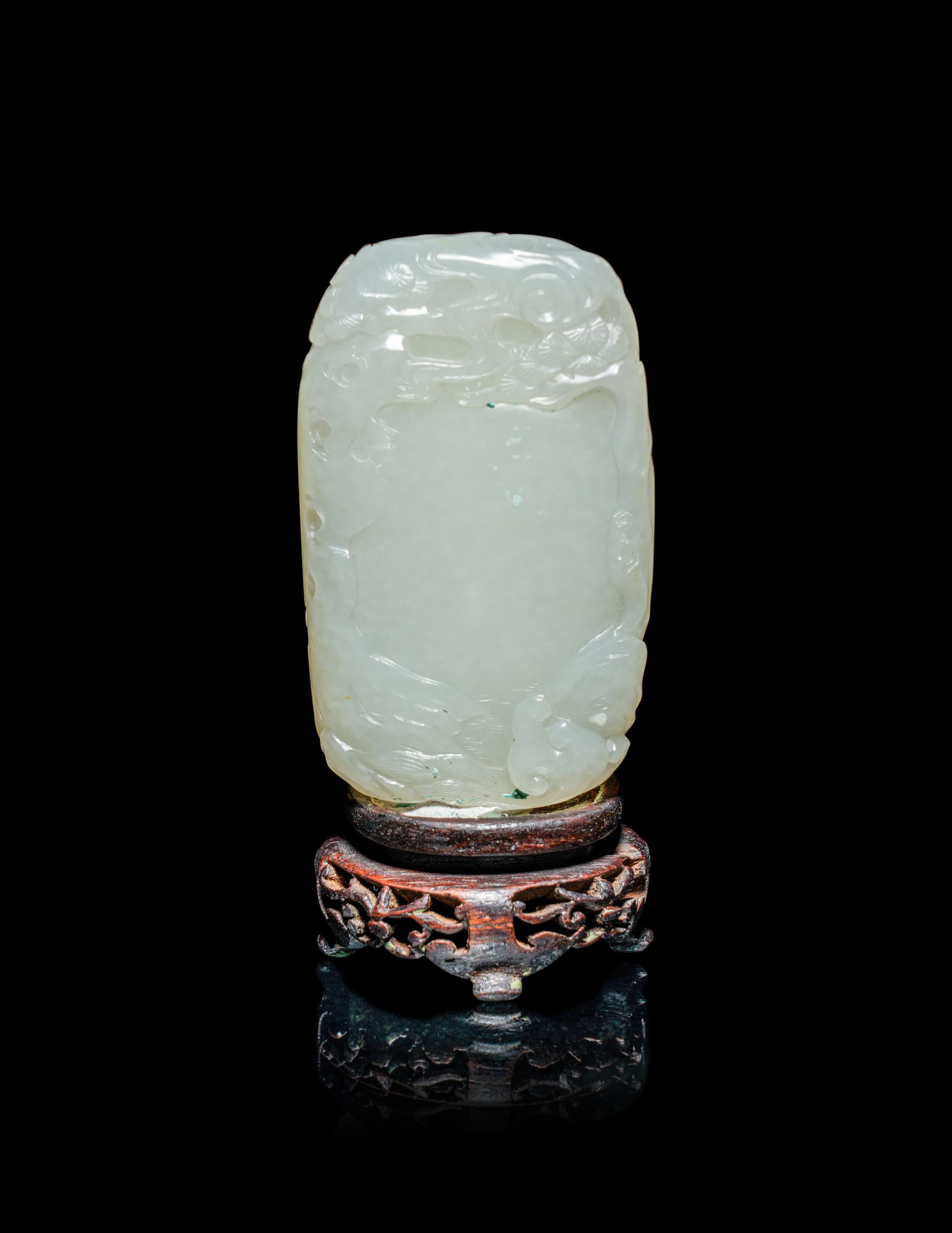 A Chinese White Jade 'Scholars Playing Go' Carving