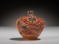 Carved Polychrome Pottery Vase