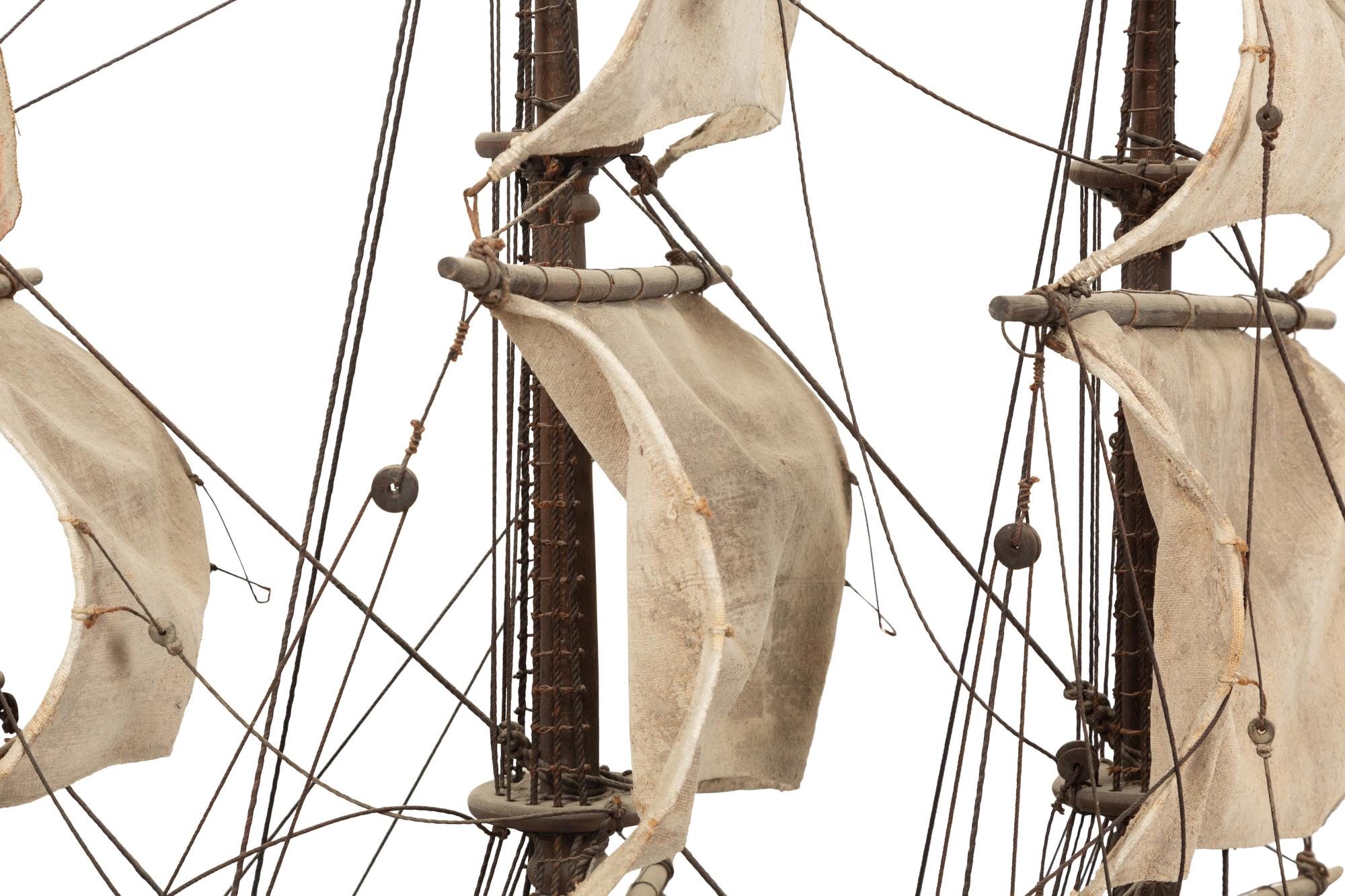 An Italian Painted and Parcel Gilt Model of a Galleon with Painted Cotton Sails