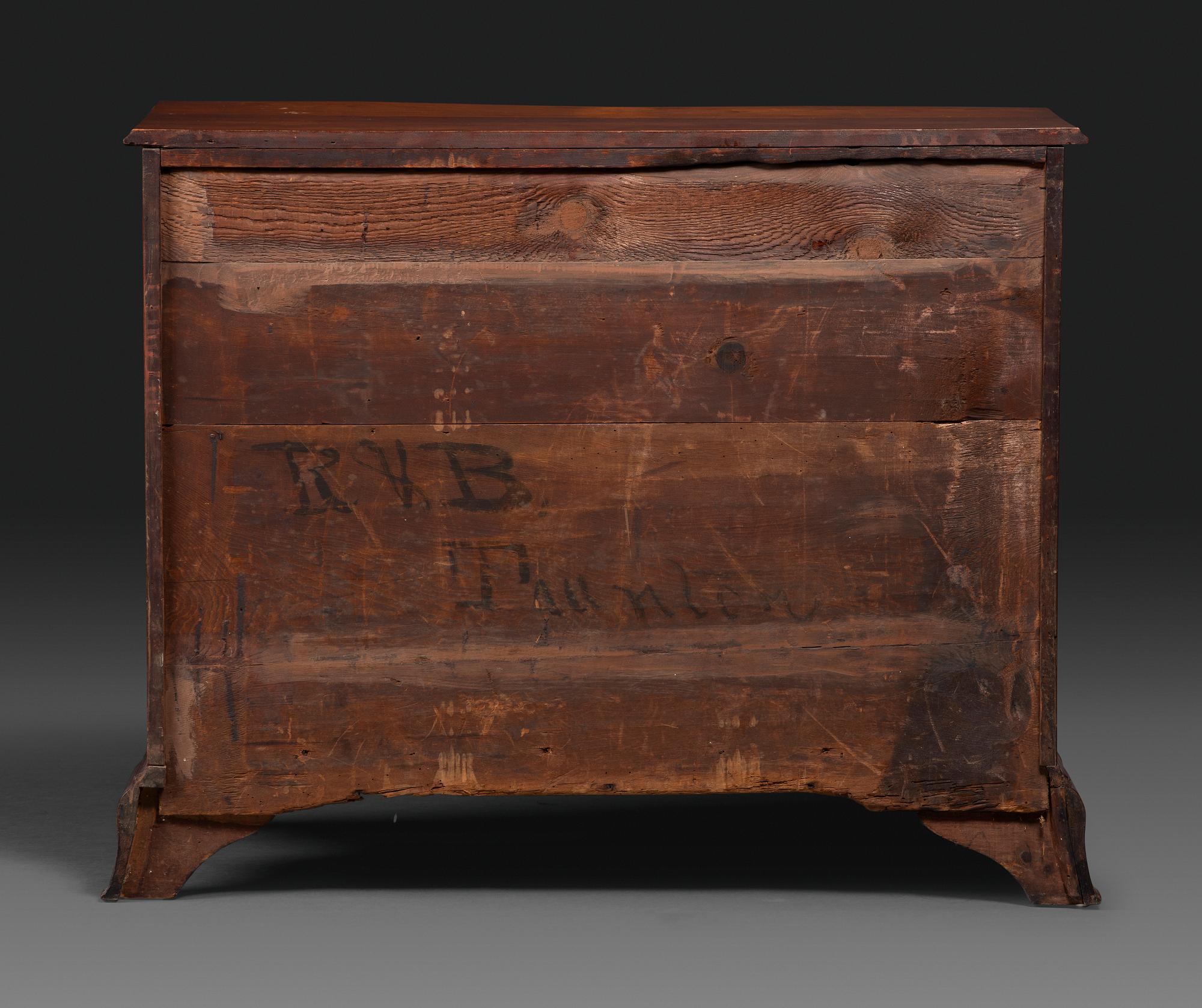 A Chippendale Carved Cherrywood Reverse-Serpentine Chest of Drawers