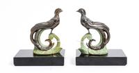 Two Pairs of Art Deco Style Cast Metal Bookends Height 9 1/8 inches. — 20TH CENTURY