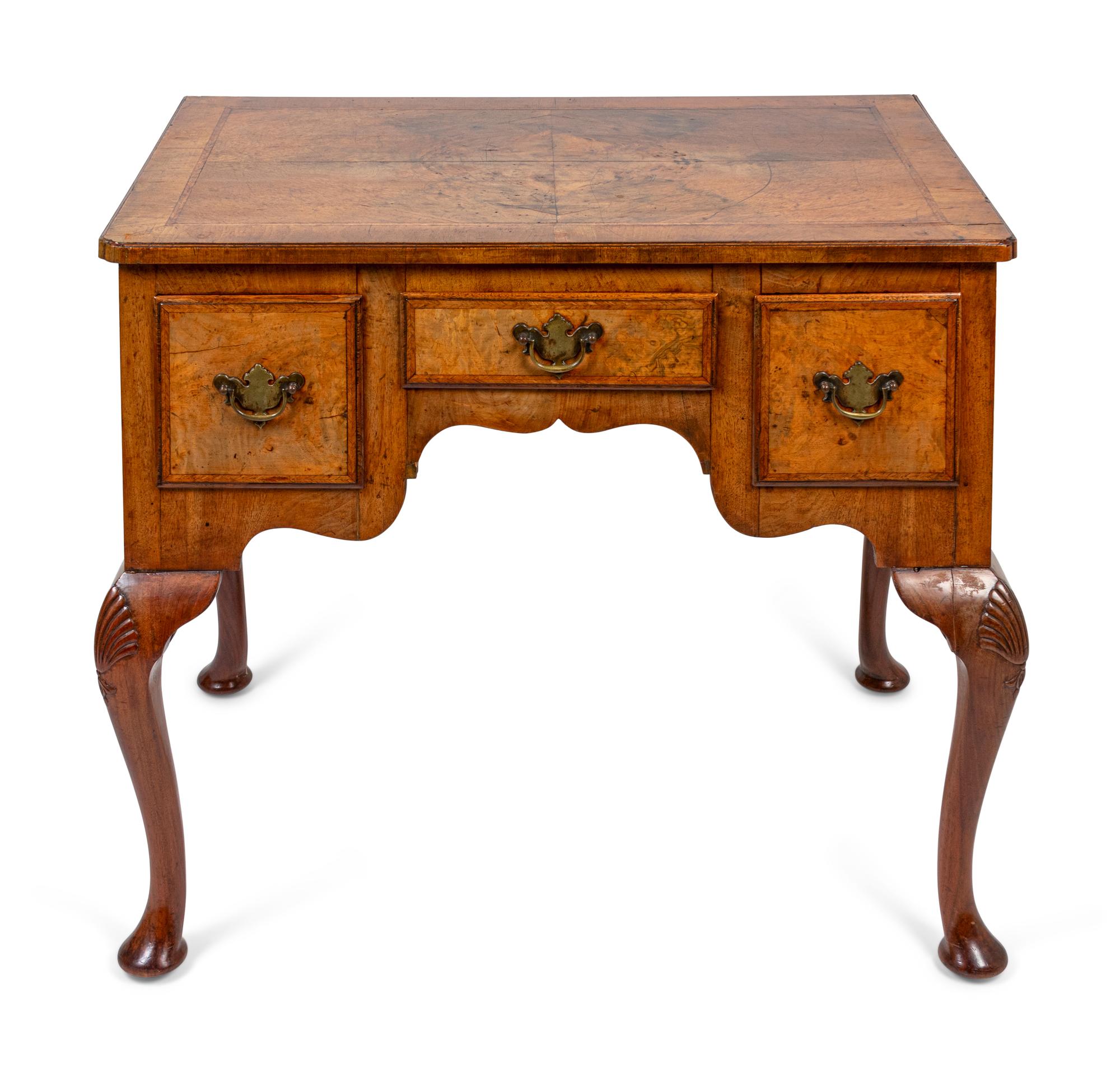 A George II Burl Shell-Carved Walnut Lowboy