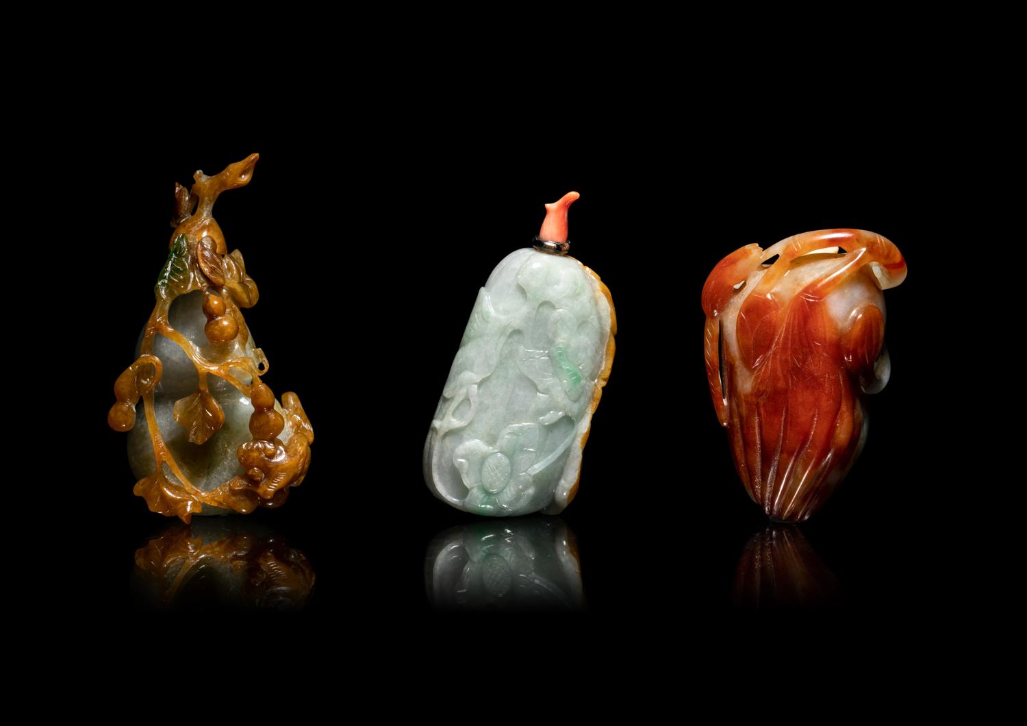 Three Chinese Russet and Green Jadeite Snuff Bottles