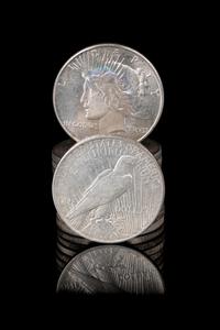 A Group of Twelve Peace $1 Coins