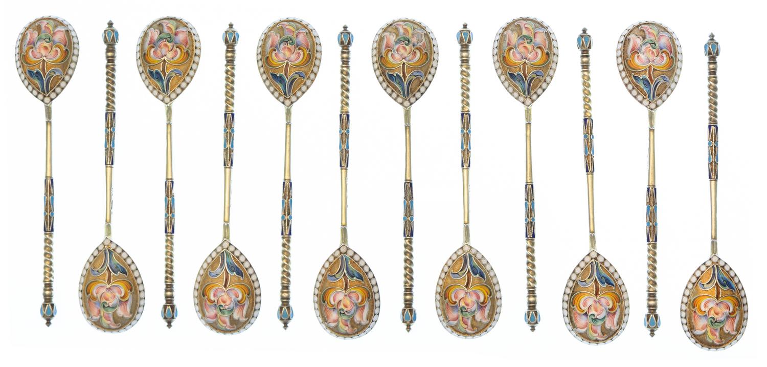 A Set of Twelve Russian Silver-Gilt and Enamel Spoons, Mark of Ivan Saltykov, Moscow, Late 19th century, each having a twist handle, th