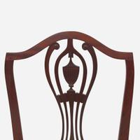 An assembled group of four Federal carved mahogany side chairs New England and other, circa 1795