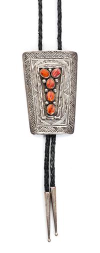 A Navajo Silver and Spiney Oyster Bolo, Lolita Platero Height 3 1/8 x width 2 inches.
