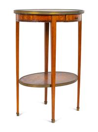 A Louis XVI Two-Tier Marble Inset Top Gilt Metal Mounted Oval Marquetry Side Table — 19TH CENTURY