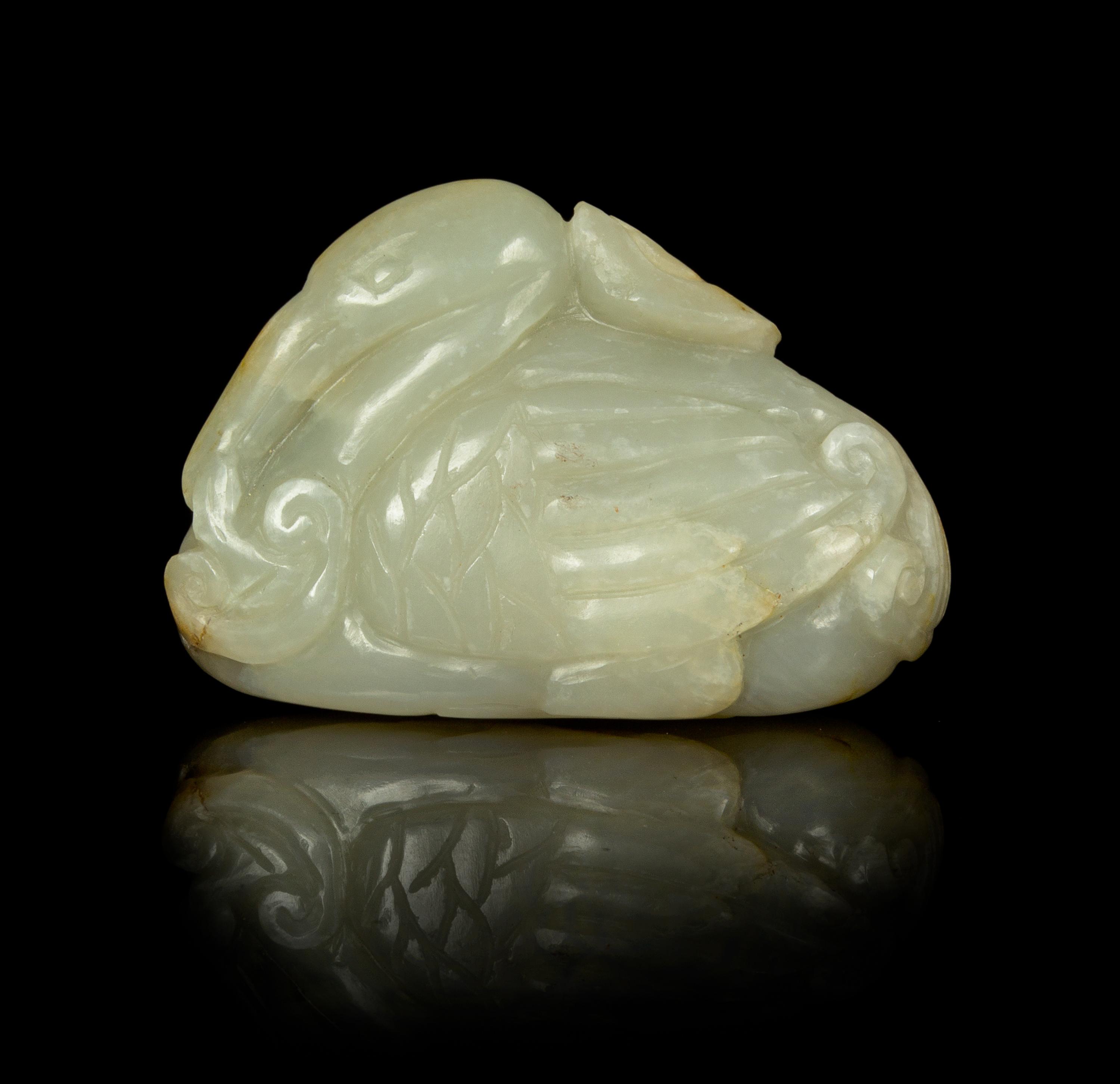 A Pale Celadon Jade Figure of a Recumbent Duck Length 3 inches.