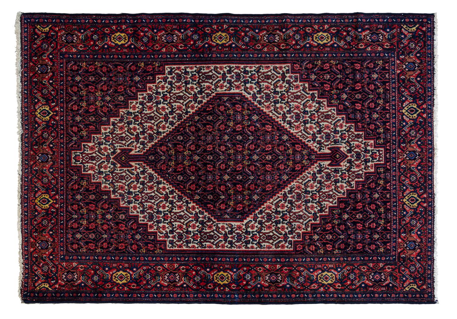 A Senneh Wool Rug 6 feet 6 inches x 4 feet 7 inches.