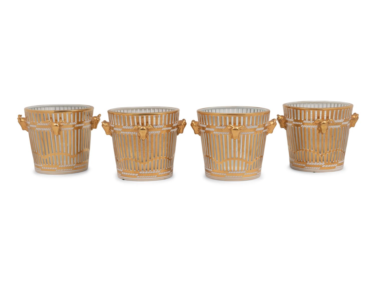 A Set of Four Contemporary Reticulated and Gilt Decorated Porcelain Jardinières