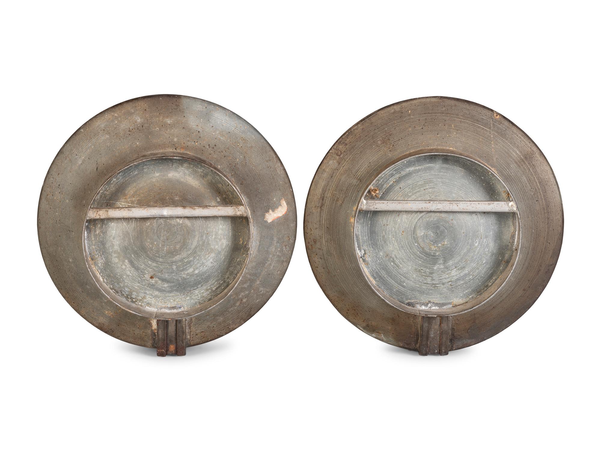 A Pair of Mirrored Tin Candle Wall Sconces