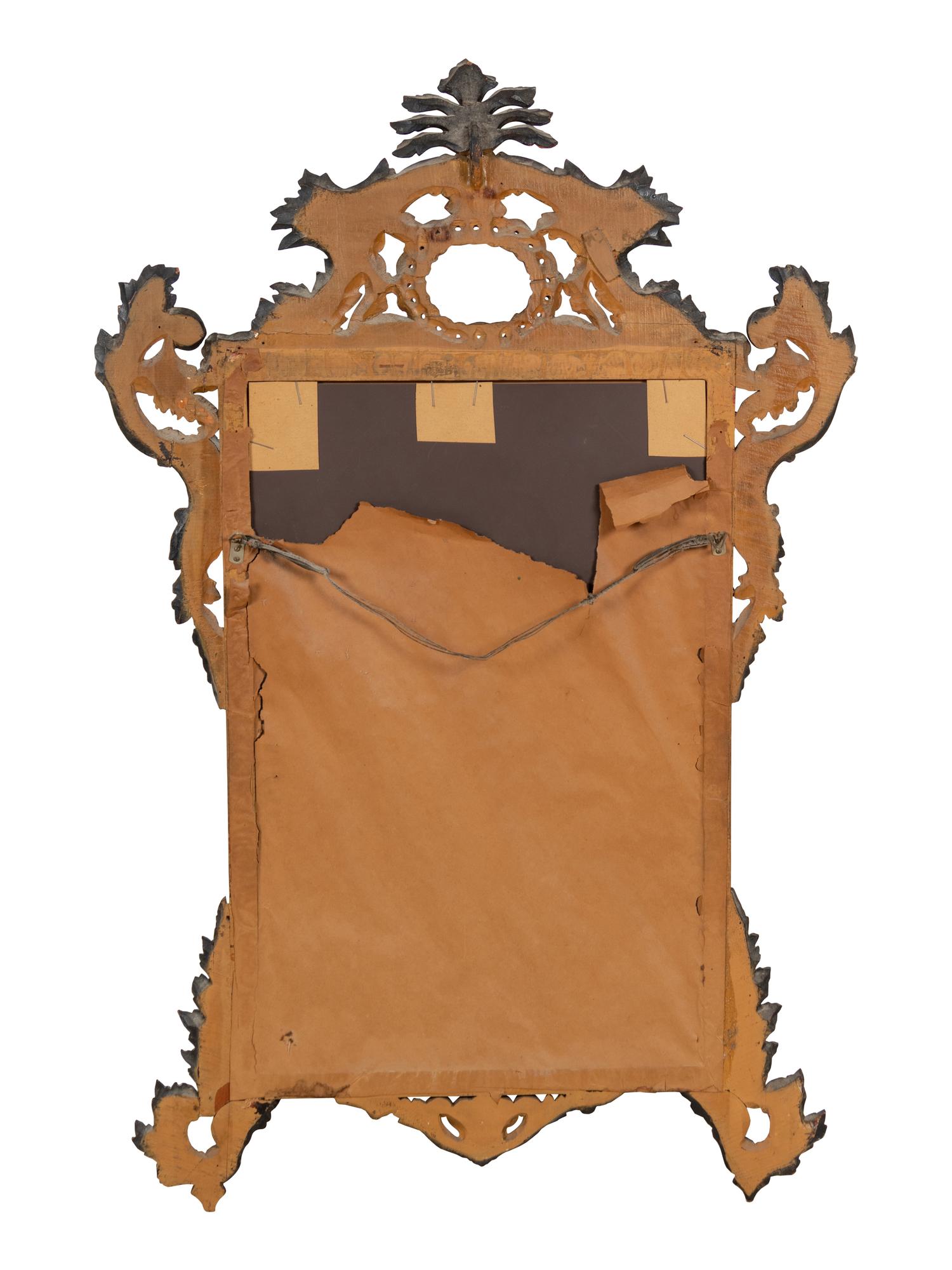 An Italian Rococo Style Painted and Parcel Gilt Mirror