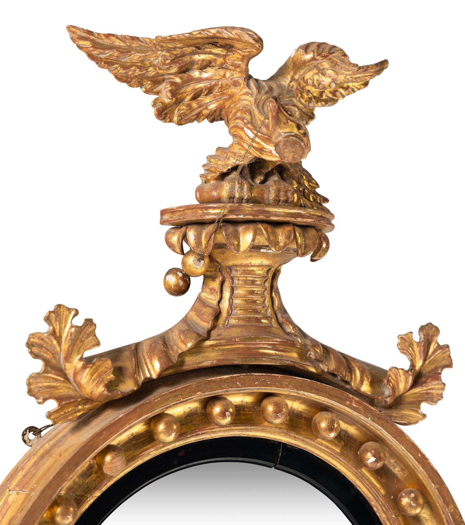 A George III Giltwood Bull's-Eye Mirror