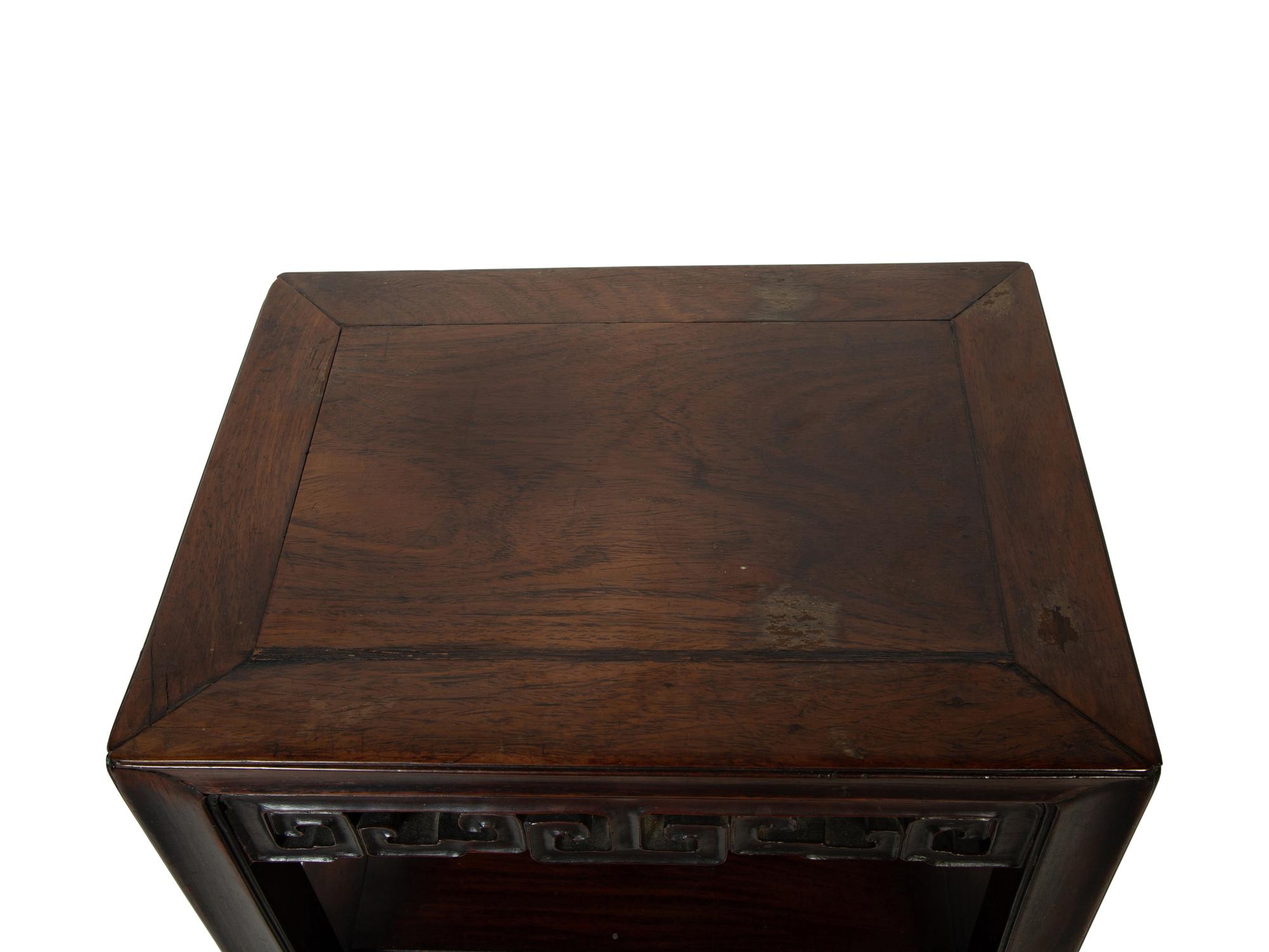 A Chinese Carved Hardwood Two-Tier Table