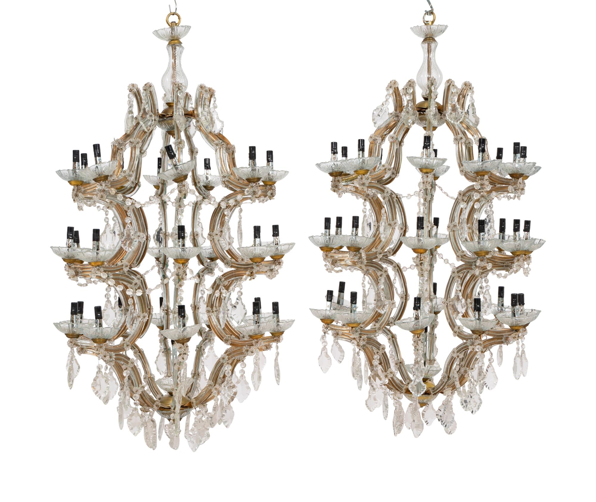 A Pair of Large Thirty-One-Light Cased Glass Chandeliers
