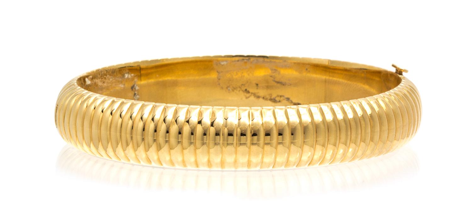 A 14 Karat Yellow Gold Bangle, 14.20 dwts.
